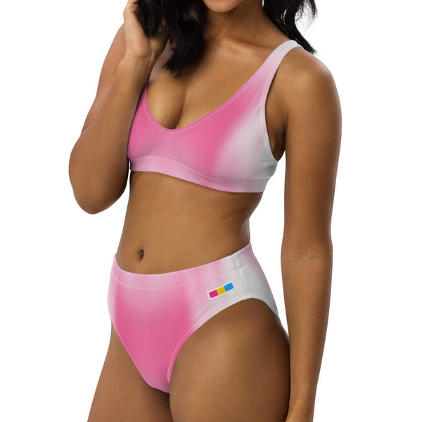 Women’s washed pink swimsuit with soft streaks and small Pansexual Pride flag on left hip
